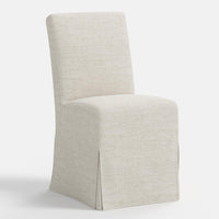 Beige chair with a textured cover on a white background
