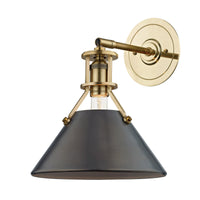 A black and distressed bronze wall sconce with a classic design, featuring a bulbous body and a swing-arm holder.