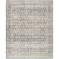 A rectangular Margaret area rug with a distressed vintage design, featuring a darker navy background with taupe and gray details.