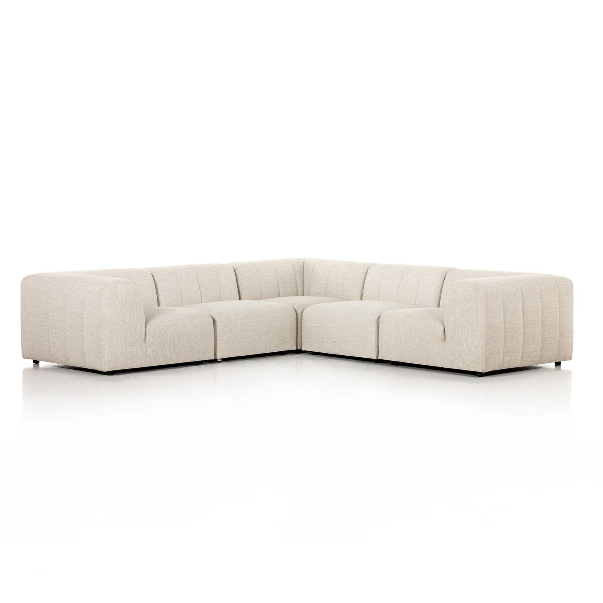 Beige sectional sofa on a white background