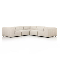 Beige sectional sofa on a white background