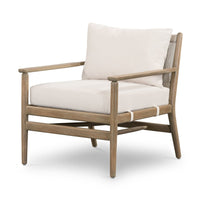 Wooden armchair with white cushions on a white background