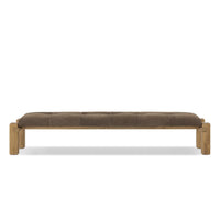 A brown upholstered bench with a cushioned top and wooden frame made from reclaimed French oak.