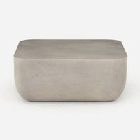 Rectangular concrete ottoman on a white background